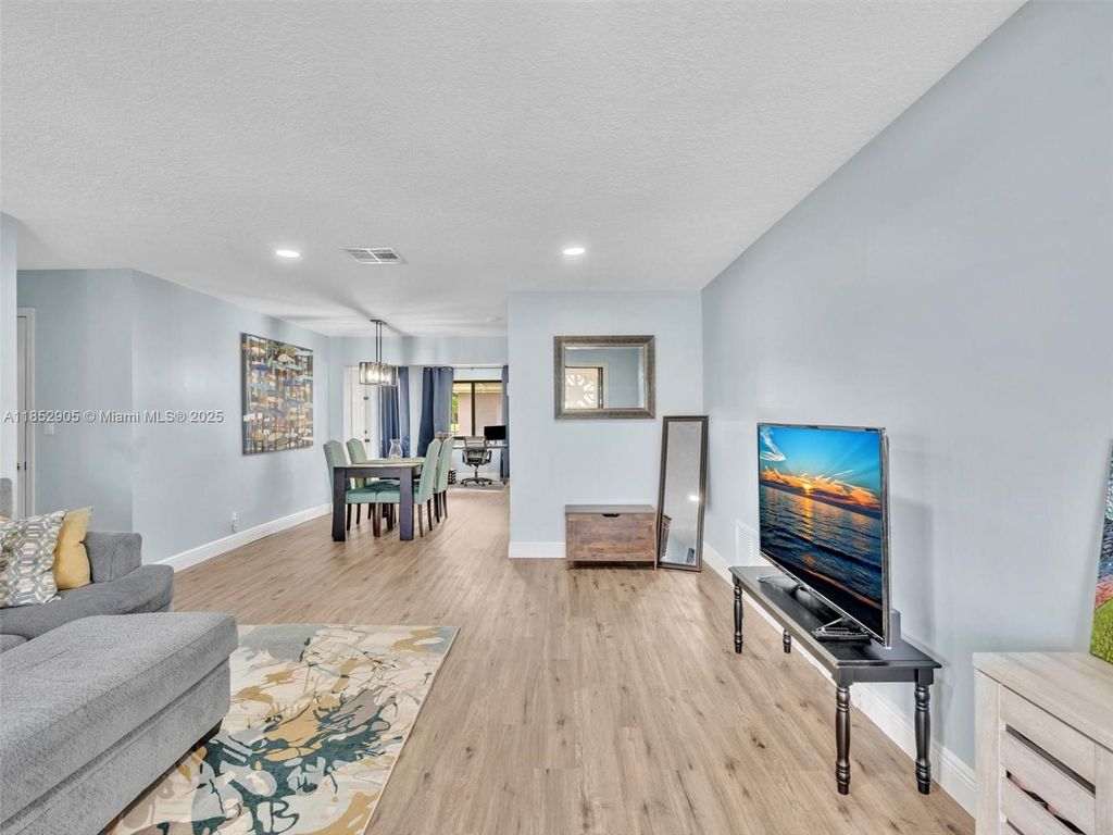 Photo of 6708 NW 58th Ct, Tamarac, FL 33321 (MLS # A11852905)