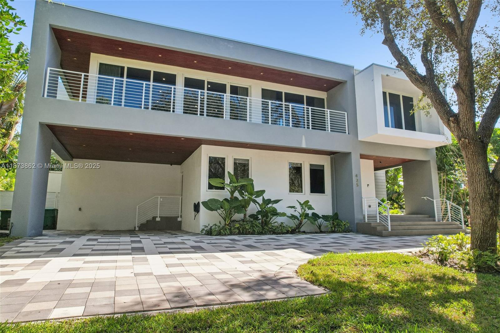 Experience unparalleled elegance in this stunning contemporary estate, set on an oversized 9,258 sq. ft. lot in exclusive Key Biscayne. Built in 2020, with a brand-new roof in 2025, this 7-bedroom, 7-bathroom home, plus two powder rooms, blends sophistication with seamless indoor-outdoor living. An open floor plan, custom-built kitchen cabinetry, and abundant natural light create an inviting ambiance. The elevator connects all three levels, leading to a rooftop terrace with breathtaking views. Outdoors, enjoy a saltwater pool with spa, summer kitchen, cabana bath, and expansive front yard. The open garage with an EV charger and a spacious driveway provide convenience. This architectural masterpiece offers the finest in Key Biscayne luxury.
