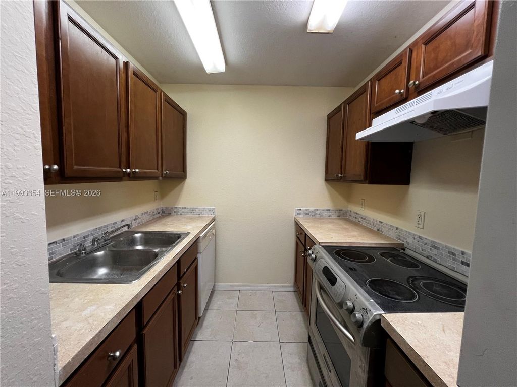 Photo of 2822 NW 55th Ave #1D, Lauderhill, FL 33313 (MLS # A11993654)