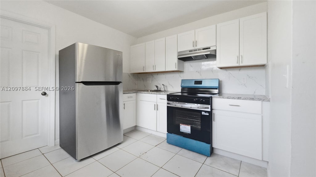Photo of 2711 SW 8th St #3, Fort Lauderdale, FL 33312 (MLS # A12097884)
