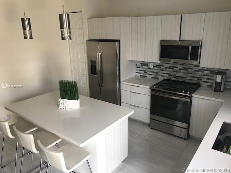 Modern Luxury Townhome BRAND NEW* TURN KEY* IN *DORAL* in the prestigious new community of SUMMIT AT PARK CENTRAL* This community provides a resort-inspired lifestyle with unparalleled amenities. This immaculate, brand new Townhome belong to the series Everest and features stainless steel appliances (included) ceramic floor and beautiful white kitchen. Marvel in the spacious Master Bedroom, and make yourself and your family comfortable with 3 extra bedrooms and 2.5 Baths. (total 4 Bedrooms and 3.5 Baths)     MUST  SEE!!!!!!!