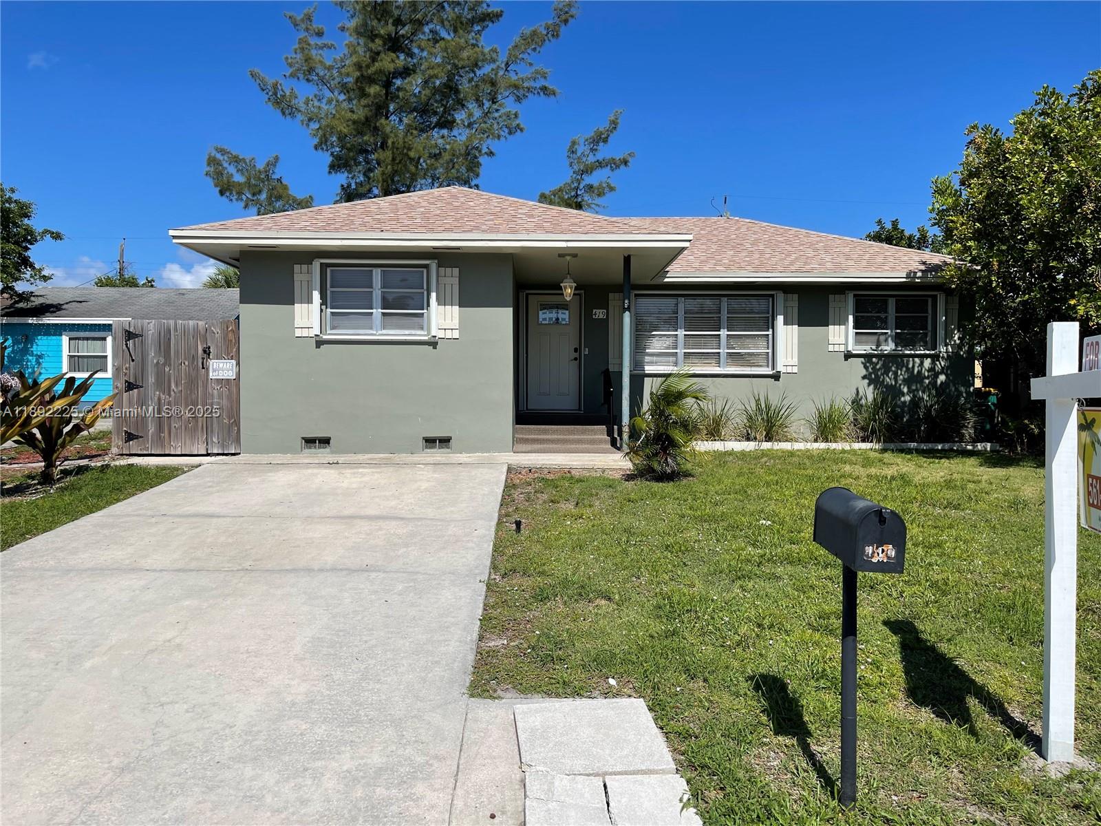 Beautiful home with large yard and covered, screened in patio with ceiling fan can serve as a second living space. Located in the heart of Lake Worth close to the Lake and Lucerne Avenues with their restaurants, boutiques and nightlife, easy access to I-95 and just 20 min to the beautiful beach. Modern kitchen with high end appliances, dishwasher and cooking island, washer dryer available, the bedrooms are large and sunny with good closet space and there's an extra office space too! Tenants only responsible for electric. Call today and make it your home!