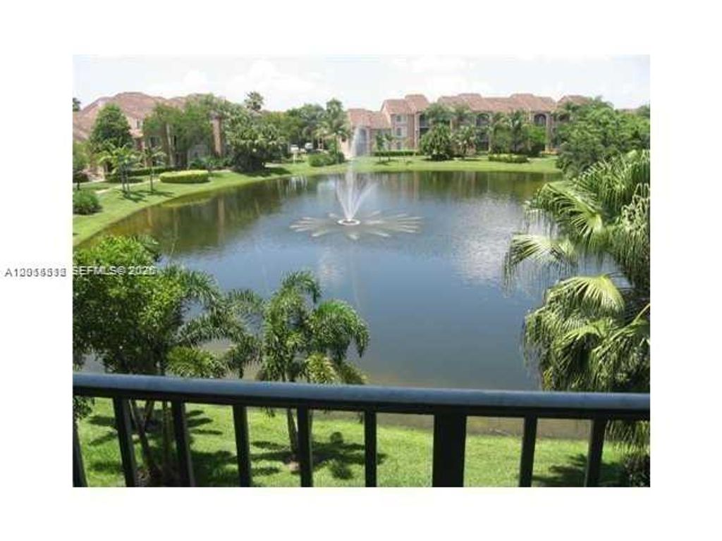 Photo of 12118 Saint Andrews Pl #304, Miramar, FL 33025 (MLS # A12015512)