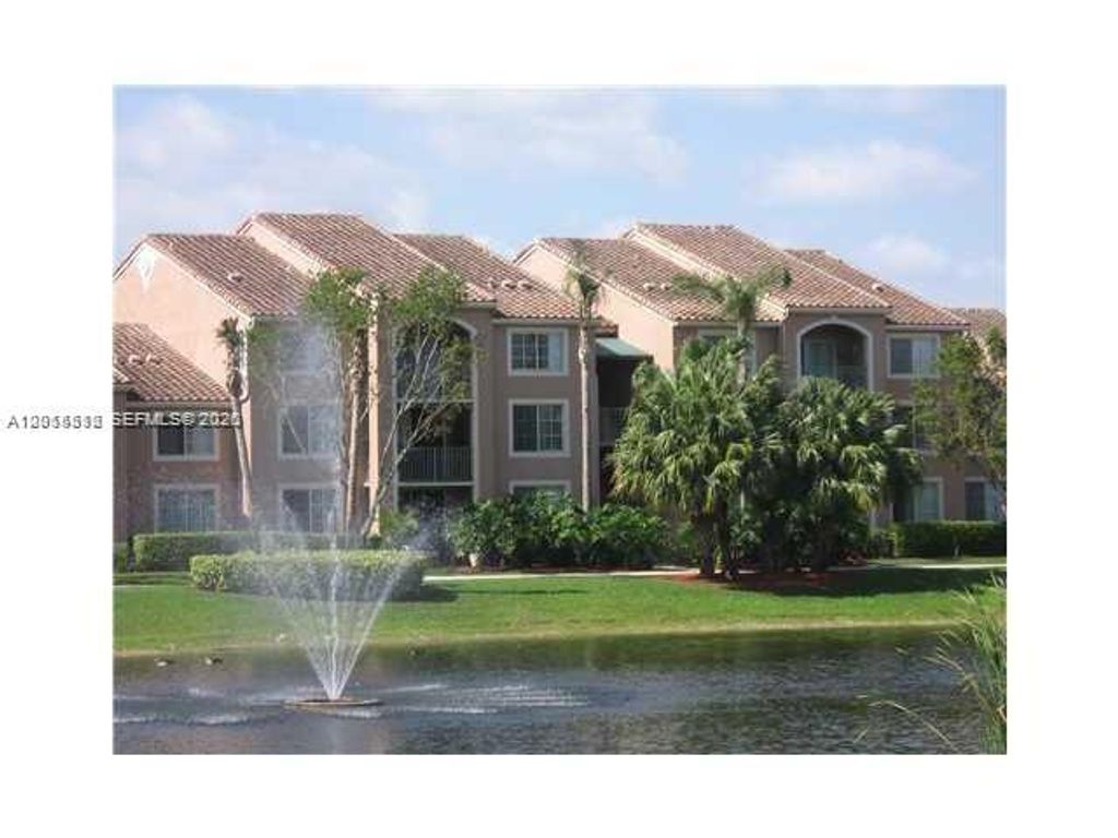 Photo of 12118 Saint Andrews Pl #304, Miramar, FL 33025 (MLS # A12015512)