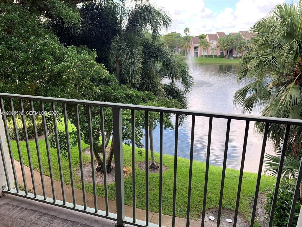 Photo of 12118 Saint Andrews Pl #304, Miramar, FL 33025 (MLS # A12015512)