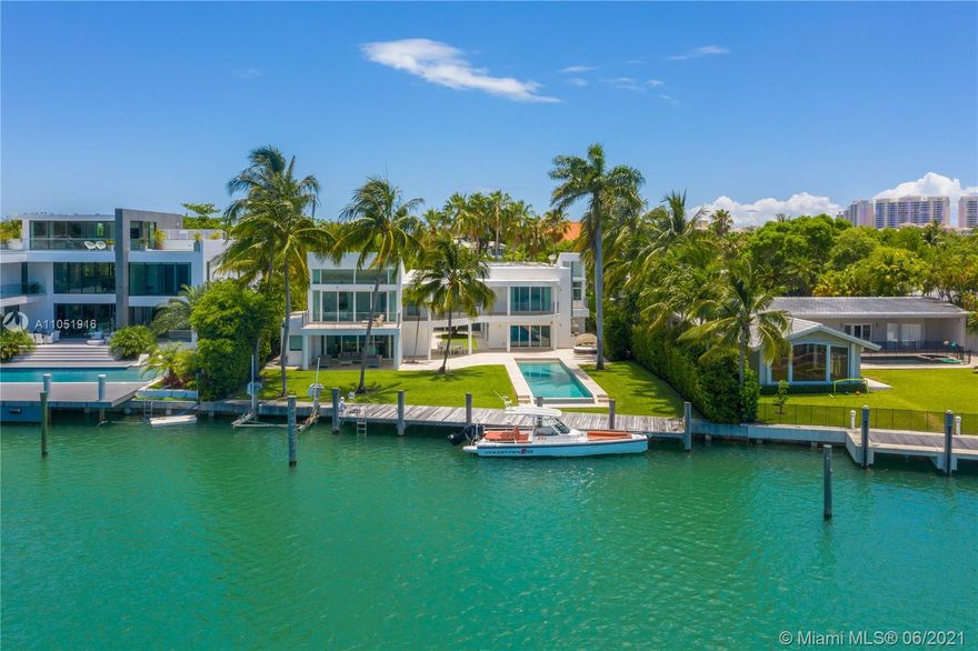 Spectacular contemporary and sophisticated waterfront residence located on private and renowned smuggler's cove with breathtaking views of the harbor and bay! Completely remodeled and meticulously designed to enjoy the exquisite architecture with incredible finishes throughout and a very elegant floor plan. This home is bright, open with walls of glass creating a seamless flow and transition from inside to outside. Luxurious but yet cozy with ample and very comfortable spaces including 4 bedrooms all in suite, 2 staff rooms, 5.5 baths, 2 car garage, BBQ area, amazing family room plus a stunning and extraordinary patio and pool area for those who like to entertain.  A boater's paradise that allows you to park a large vessel or yacht with 100 Ft on the water. Location is everything!