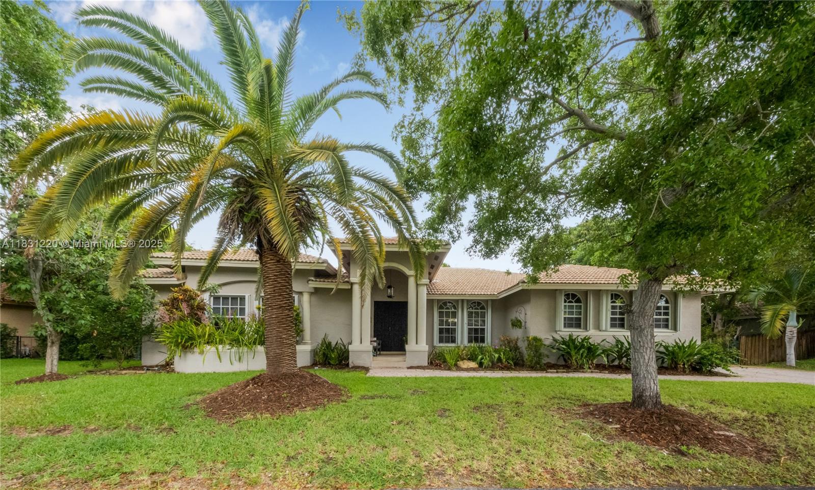 Welcome home to this beautiful property in Palmetto Bay's exclusive gated community, The Grove at Old Cutler. This home truly stands out, boasting a newly remodeled, modern kitchen with stunning countertops & a sleek backsplash. The appeal extends beyond the interior with an equally impressive outdoor space. Enjoy a refreshing screened pool, a fantastic, covered terrace, and mature mango trees. Inside, you'll find elegant crown molding, a practical combination of tile in the living areas, and wood laminate in the bedrooms. High ceilings in the living room contribute to a spacious & inviting atmosphere. Additional conveniences include a converted garage flex space, hurricane shutters, a spacious shed for extra storage, brand-new air conditioning unit, & a second unit that's three years old.