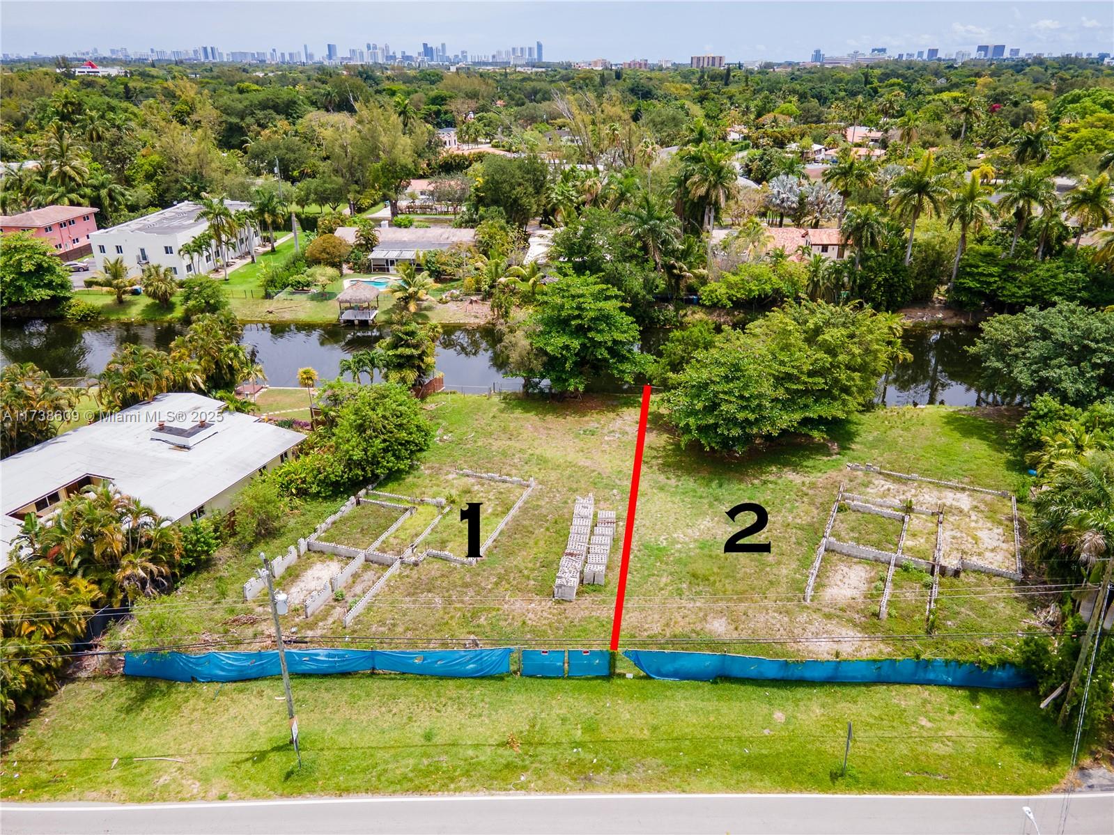 FIRE SALE - recently reduced and One in lifetime opportunity to purchase the largest continuous waterfront lot for sale at 11565 (15,711 Sq. ft.) & 11595 (16,183 Sq. ft.) W BISCAYNE CANAL RD. Folio No's. 30-2231-063-0010 & 30-2231-063-0020. Exquisite, centralized and one of the most sought and desirable locations with waterfront and concrete walkaround boat dock., Will sell vacant lots as is. Please email all inquiries and provide verifiable proof of funds with any interest, all offers considered no reasonable offer refused. Thanks for looking!