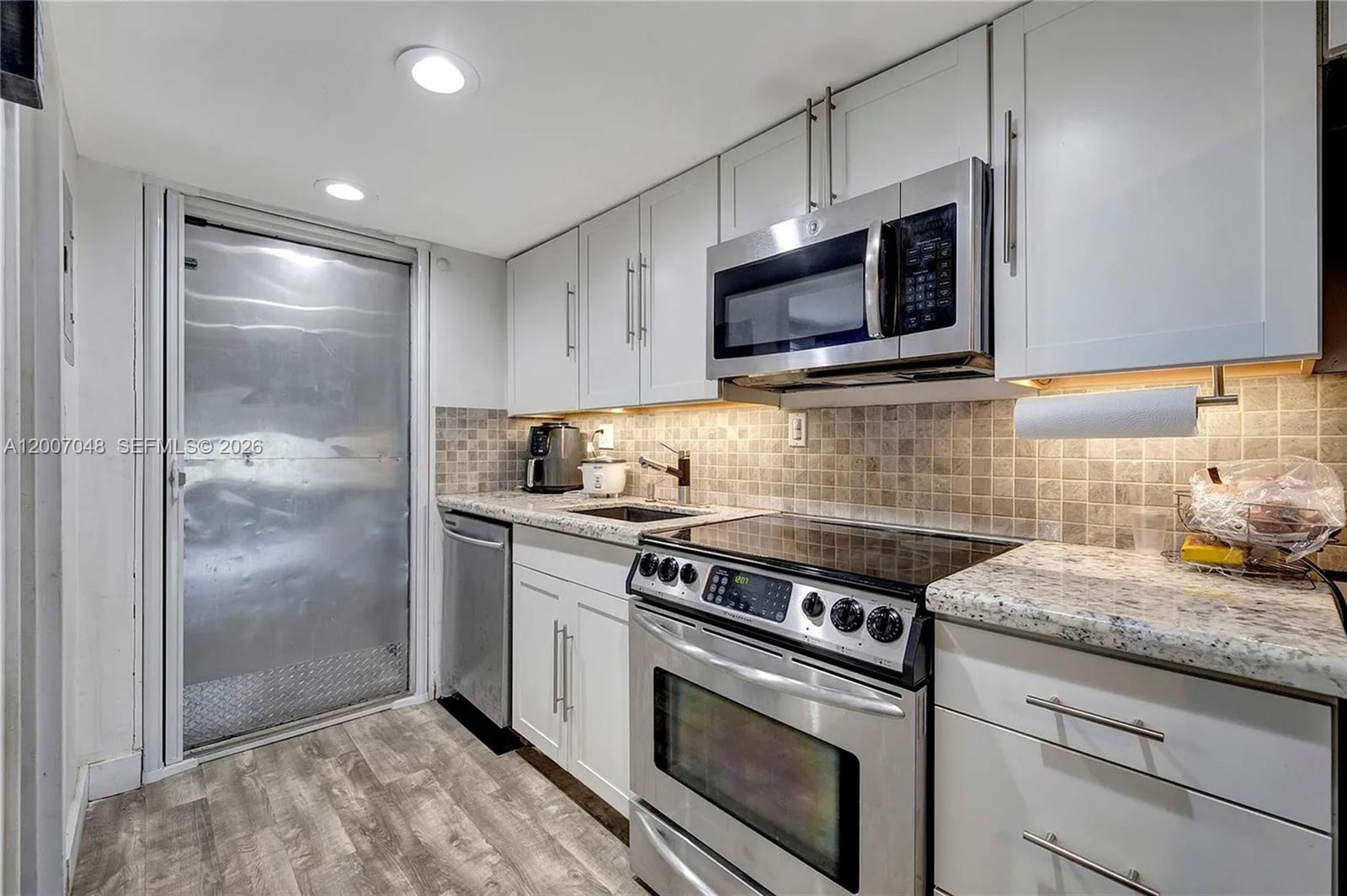 4121 NW 26th St T16