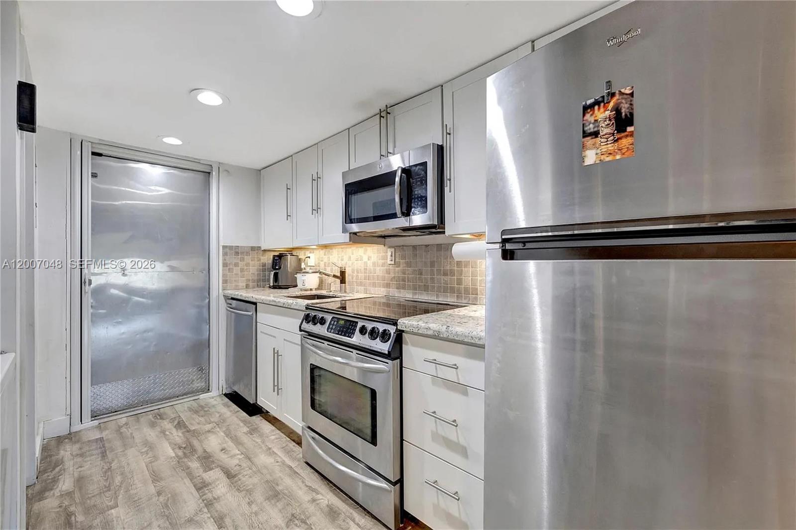 4121 NW 26th St T16