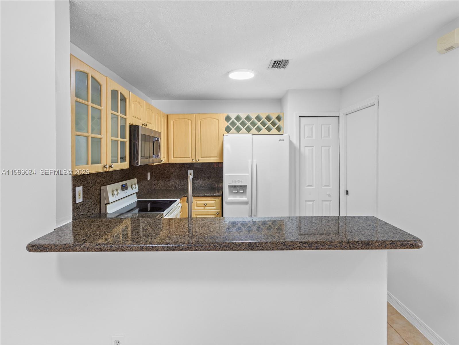 THE GATES AT DORAL ISLES - Residential Lease