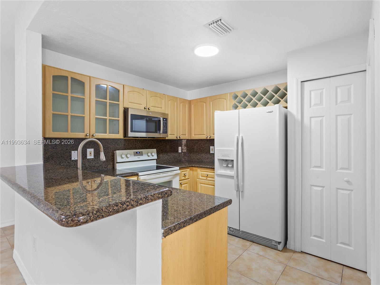 THE GATES AT DORAL ISLES - Residential Lease