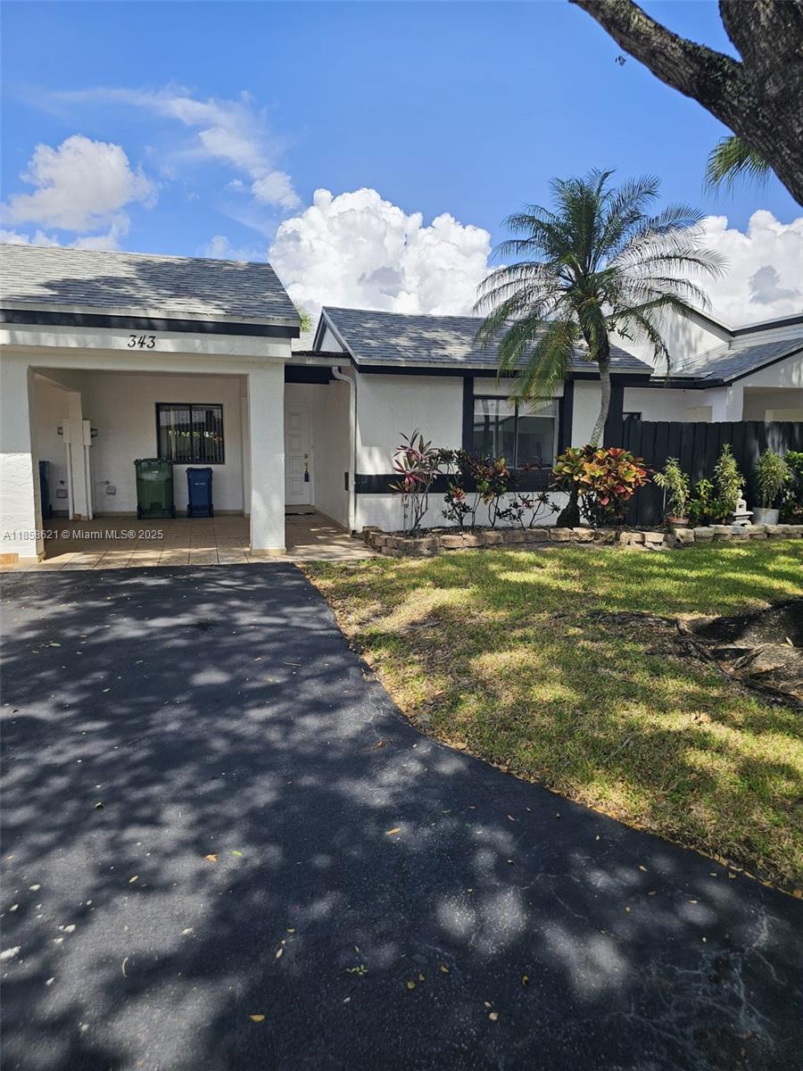 Live in one of the safest and most desirable areas of South Florida: Weston, renowned for its exceptional quality of life, thoughtful urban planning, and family-friendly atmosphere. This elegant villa in a tranquil neighborhood offers three spacious bedrooms, two fully renovated bathrooms, and a modern kitchen that combines style and functionality, along with a standard washer and dryer for added convenience. Enjoy a large covered patio with views of the garden and pool—perfect for entertaining or relaxing. Weston boasts top-rated schools, beautifully maintained parks, bike paths, scenic lakes, and full recreational facilities, providing your family with a safe, active, and healthy lifestyle. More than a house, this is a true home where lasting memories are created.