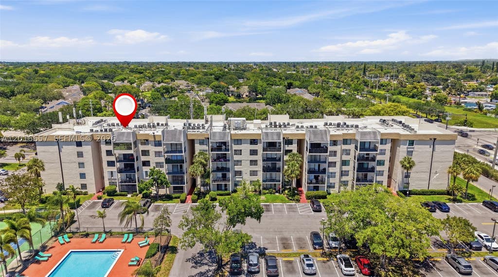 Photo of 6195 Rock Island Rd #511, Tamarac, FL 33319 (MLS # A12016657)