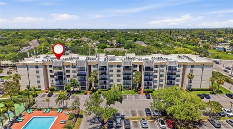 Photo of 6195 Rock Island Rd #511, Tamarac, FL 33319 (MLS # A12016657)