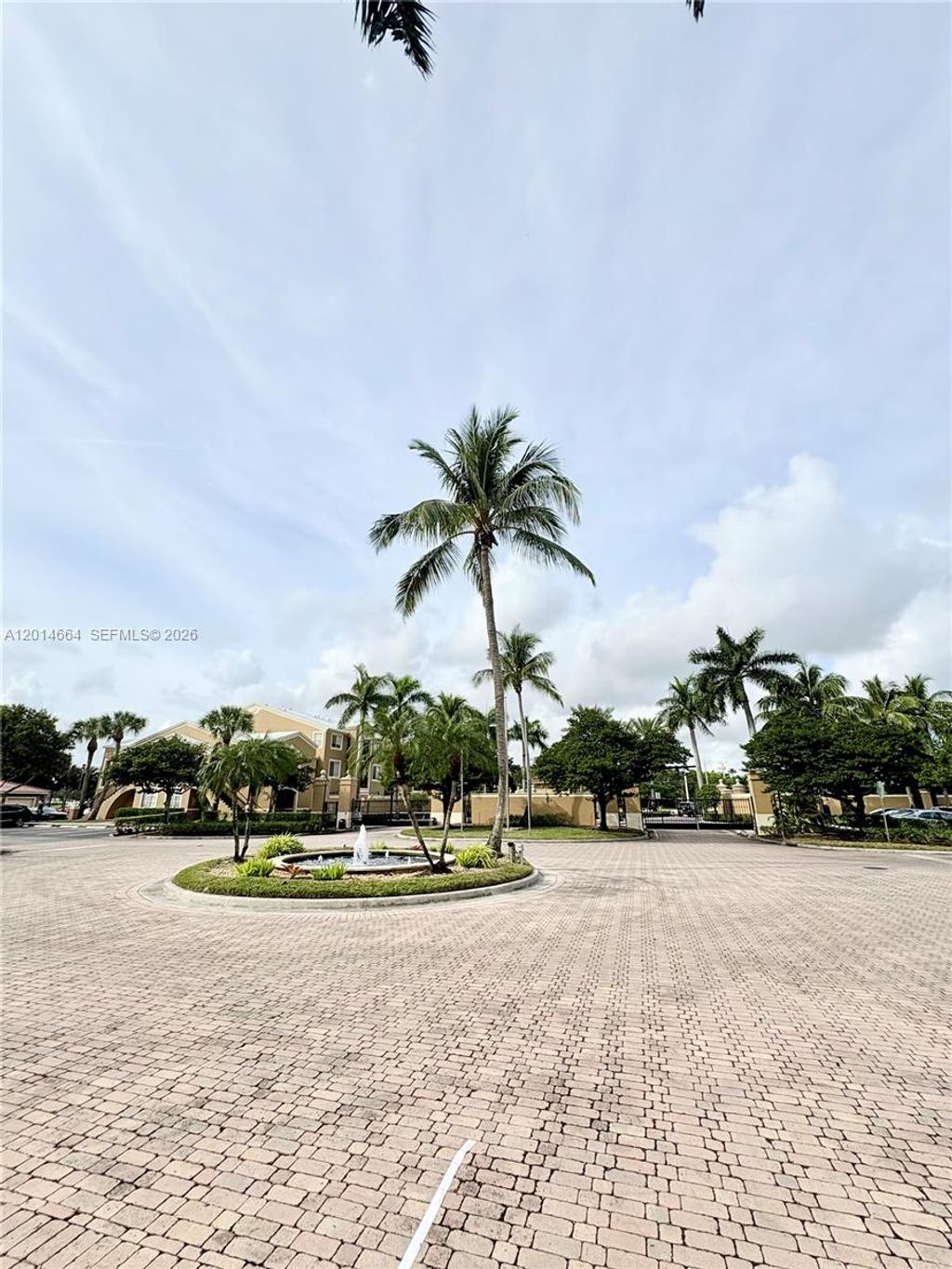 Photo of 8030 N Nob Hill Rd #105, Tamarac, FL 33321 (MLS # A12014664)