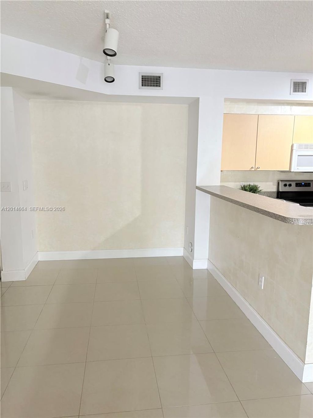 Photo of 8030 N Nob Hill Rd #105, Tamarac, FL 33321 (MLS # A12014664)