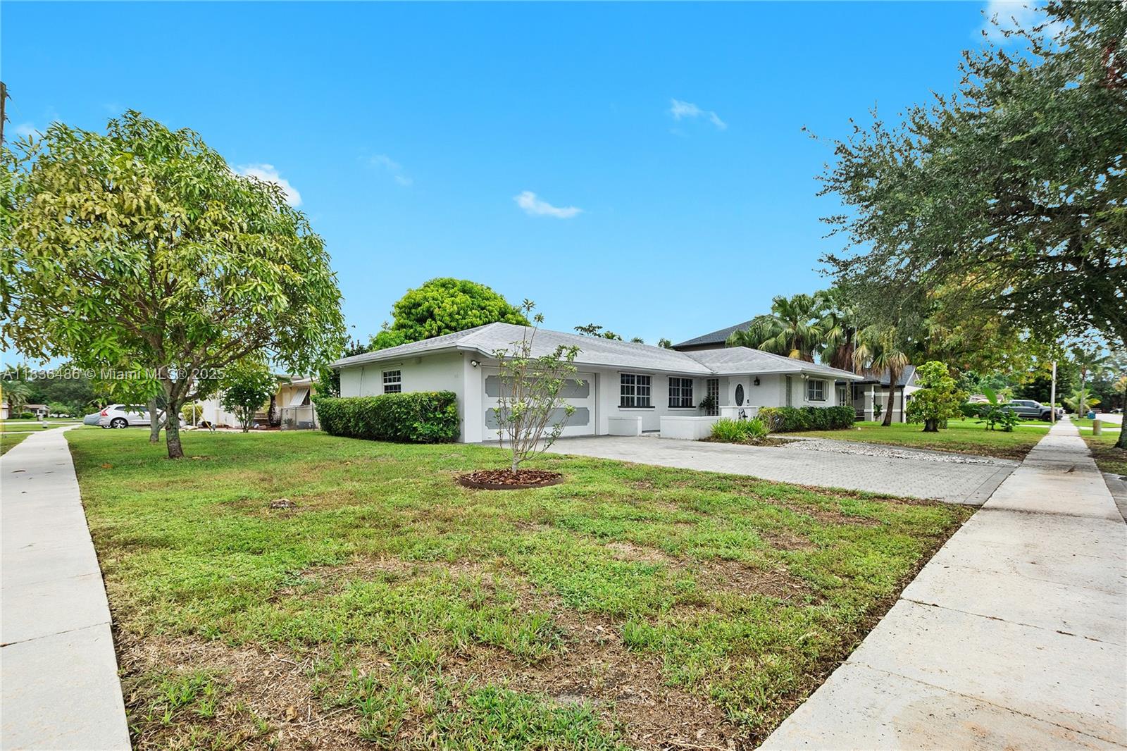 NO HOA Corner Lot, 3-bedroom, 2-bath home located in the heart of Plantation. With a spacious 2-car garage and an inviting layout with covered back patio. This home offers comfort and convenience for everyday living. Enjoy recent upgrades including a 3 year old Tankless Water Heater and a 1 year old A/C unit, ensuring energy efficiency and year-round comfort. Roof 6 years old. There is also a 20' water view canal. The covered back patio is perfect for relaxing or entertaining outdoors.
Situated just 3 minutes walk to Publix, a local kids' playground, and the world-renowned Sawgrass Mills Mall, where all your shopping and dining and recreation are.
Don’t miss this move-in ready gem in a highly sought-after neighborhood!