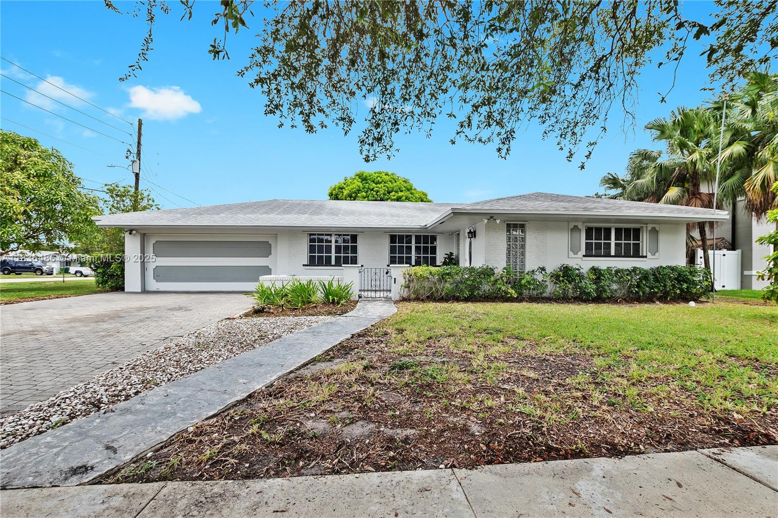 NO HOA Corner Lot, 3-bedroom, 2-bath home located in the heart of Plantation. With a spacious 2-car garage and an inviting layout with covered back patio. This home offers comfort and convenience for everyday living. Enjoy recent upgrades including a 3 year old Tankless Water Heater and a 1 year old A/C unit, ensuring energy efficiency and year-round comfort. Roof 6 years old. There is also a 20' water view canal. The covered back patio is perfect for relaxing or entertaining outdoors.
Situated just 3 minutes walk to Publix, a local kids' playground, and the world-renowned Sawgrass Mills Mall, where all your shopping and dining and recreation are.
Don’t miss this move-in ready gem in a highly sought-after neighborhood!