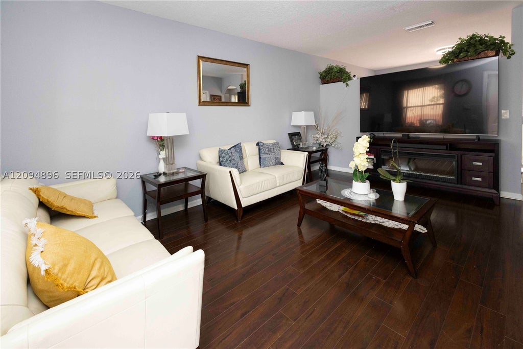 Photo of 873 NW 135th Ave, Pembroke Pines, FL 33028 (MLS # A12094896)