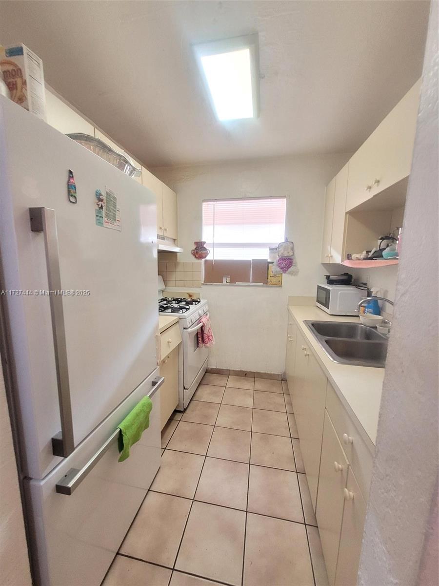 ROYAL PALM GARDENS CONDO - Residential