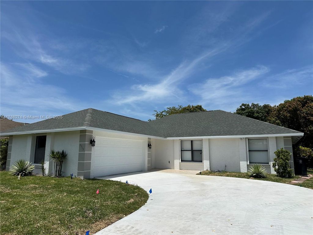 Photo of 2313 SE Harrington Ave, Port Saint Lucie, FL 34952 (MLS # A11788274)