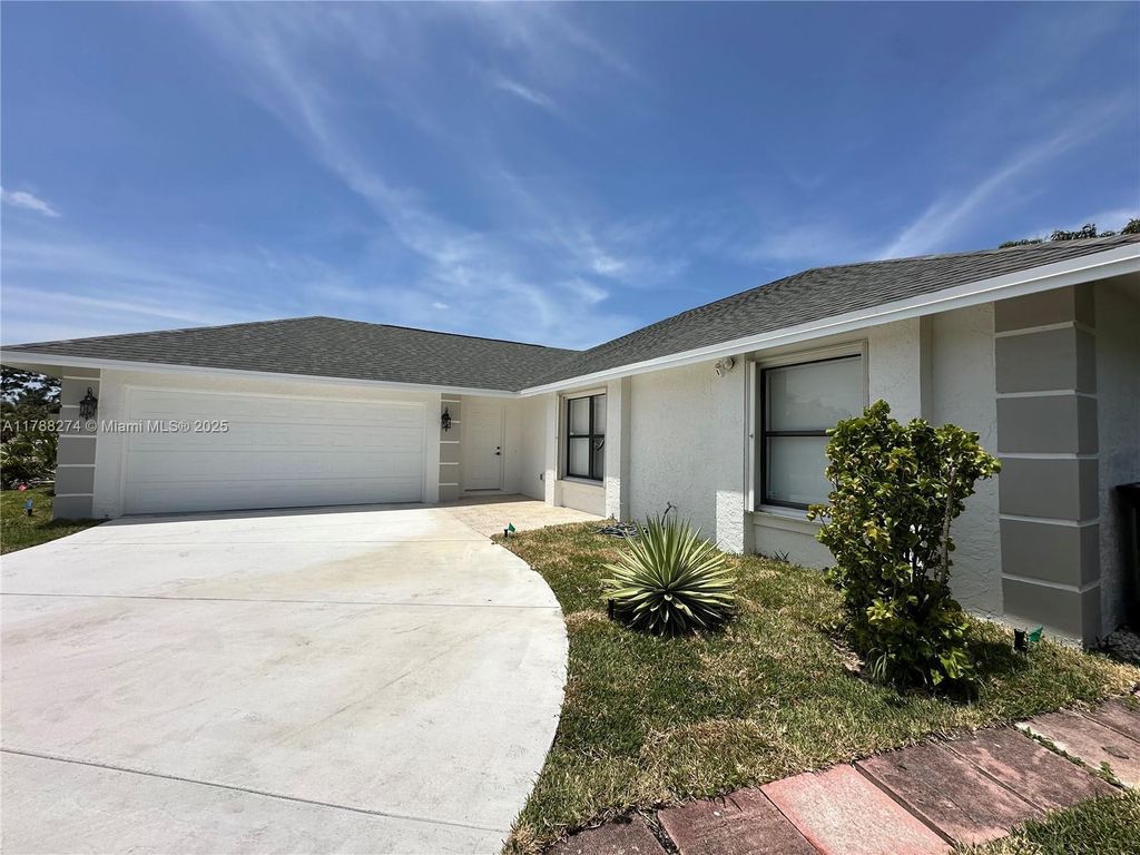 Photo of 2313 SE Harrington Ave, Port Saint Lucie, FL 34952 (MLS # A11788274)