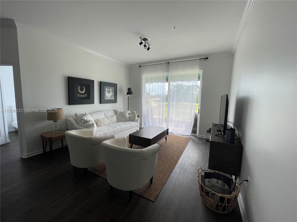 Photo of 11720 Saint Andrews Pl #302, Wellington, FL 33414 (MLS # A11996231)