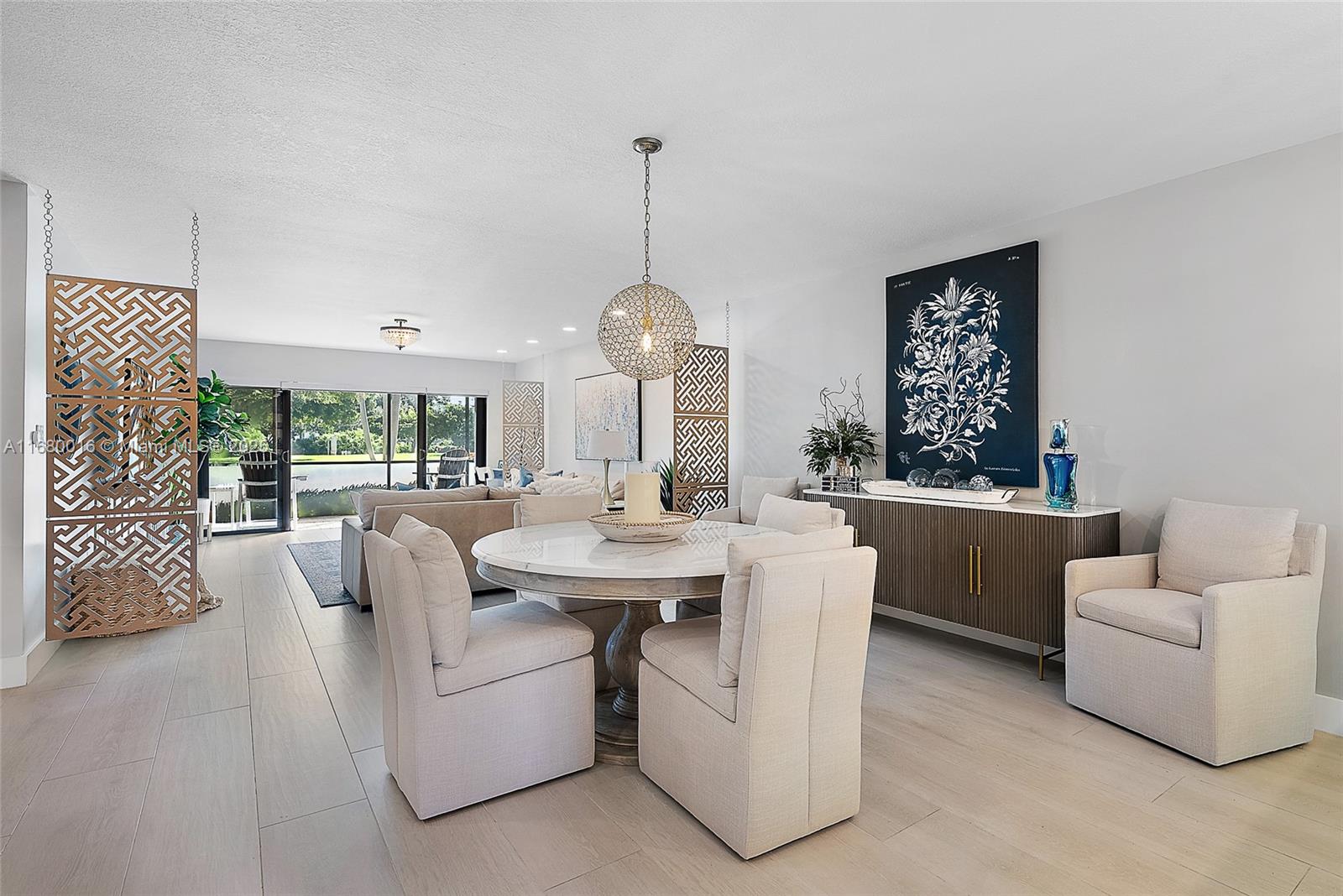 Dream Beach Condo in Jupiter! Coastal luxury fully renovated 2/2 bathroom first-floor condo, perfectly situated to capture the essence of Jupiter living Inside, this first-floor unit offers both front & back patios. Inside you'll find elegant finishes including custom cabinetry, stunning waterfall quartz countertops & wood-look plank tile flooring throughout. The bathrooms are sleekly modernized, the ceilings raised for a more open feel, newer ductwork ensures optimal comfort & a full home water filtration system. Enjoy waking up moments from the beach, where you can stroll along the shores, enjoy the vibrant Jupiter Inlet, or catch a show at the renowned Maltz Theatre. Ultimate convenience, being close to Love Street's popular dining & shopping spots & 30 minutes from the PBI airport.