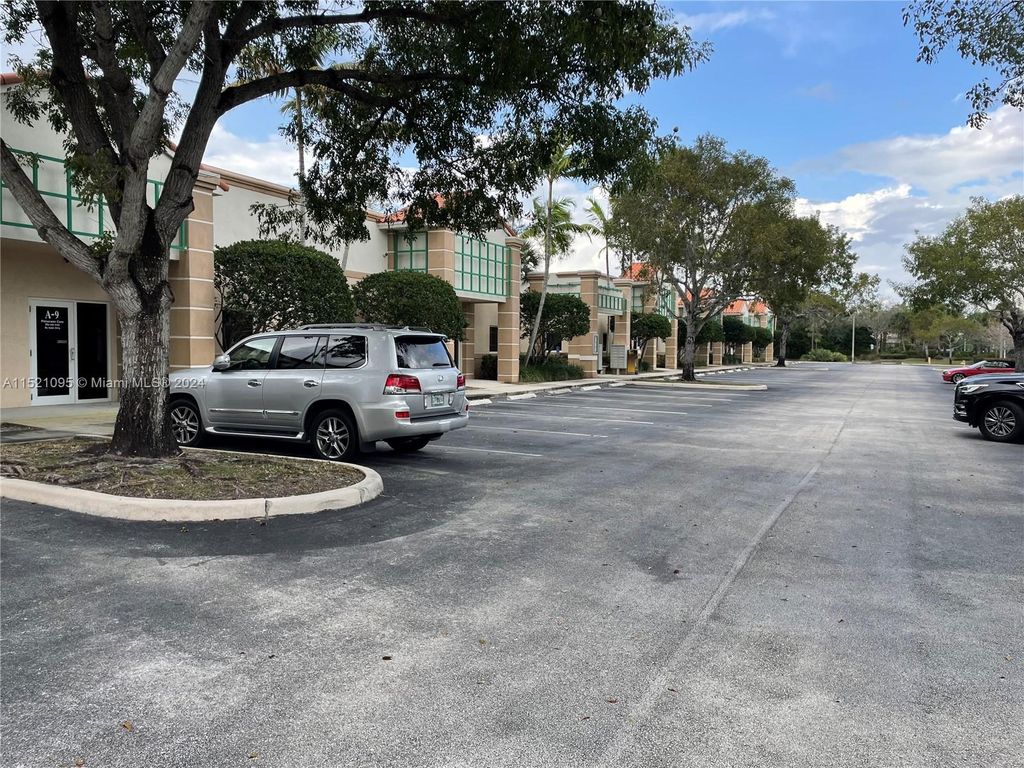 Photo of 4851 W Hillsboro Blvd #A8, Coconut Creek, FL 33073 (MLS # A11521095)