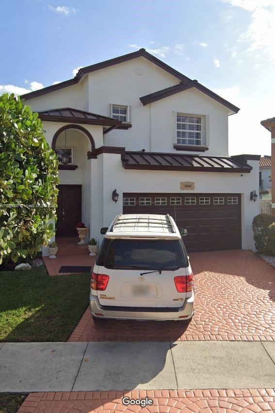 Welcome to your dream home in San Pedro Estates! This beautifully maintained residence sits on a 4,773 s/f lot and features a 2-car garage. This home offers 3 bedrooms and 2.5 bathrooms in 2,637 total s/f. Inside, you'll find vaulted ceilings, ceramic tile, and rich cherry oak wood flooring. The kitchen features stainless steel appliances and granite countertops. The home is equipped with enhanced security, including a whole-house intercom system, Brinks-ready alarm, and security cameras. Recent updates include a new roof (2024), 7-year-old AC unit, tankless water heater, fresh interior paint, Nest thermostat, and a smart lock entry system. Step outside into your own tropical oasis with mature papaya, mango, and loquat trees.