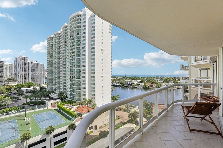Beautiful 2BD/2BA condo at The Terraces at Turnberry in Aventura! This 11th-floor residence offers 1,500 sq ft with a split floor plan, wood floors, granite counters, custom closets, and Hunter Douglas shades. Expansive balcony showcases stunning Intracoastal and ocean views. Includes washer & dryer in the unit for convenience. Spacious bedrooms with walk-in closets, large master bath with dual vanities, and an open living/dining area filled with natural light. Enjoy resort-style amenities including concierge, valet, pool, spa, fitness center, tennis, racquetball, gourmet market, and clubhouse. Prime location near Turnberry Golf Course, Aventura Mall, beaches, dining, entertainment, and top-rated Aventura schools. Move-in ready and beautifully maintained!
