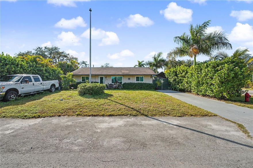 Beautifully maintained 3BD/2BA single-family home in a prime Fort Lauderdale location. Features a modern kitchen with granite countertops, custom wood cabinetry, wine rack, and stainless-steel appliances. Freshly painted interior with tile flooring throughout main living areas. Spacious primary suite with walk-in closet. Situated on a fully fenced 8,328-sq-ft corner lot with tiki hut and large deck—ideal for entertaining, with room for a pool. Impact windows, no HOA, and low property taxes. Convenient access to I-95, I-595, Downtown Fort Lauderdale, Las Olas, airport, beaches, shopping, and dining. Motivated seller — property priced below market value for a quick sale. Offered AS-IS.
