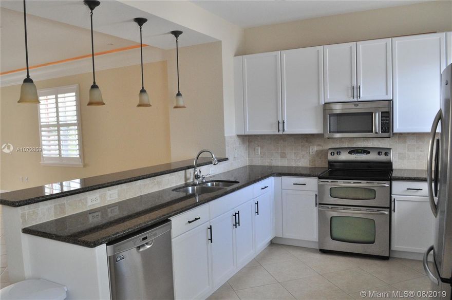 >>SHOWINGS BEGIN SEPT 1st<< Magnificent 4-level Mediterranean style Townhouse with AMAZING ROOFTOP TERRACE in central East Fort Lauderdale location! Gated and secure complex just seconds to Sunrise Beach & Galleria Mall, and minutes to Downtown/Las Olas. Townhouse is in great condition! 3 bedrooms, 3.5 baths, 4th floor loft, 2 car attached garage. Fresh paint. New rooftop terrace 2019. End unit with lots of light, soaring ceilings, crown moulding, impact windows, granite countertops, plantation shutters, master bath has roman tub & separate shower, laundry room... upgrades throughout! Great location within Villa Medici community and steps away from pool! Walk or bike to the beach, Publix, shopping, dining, entertainment and Gateway Theatre! Great neighbors! This location can't be beat!