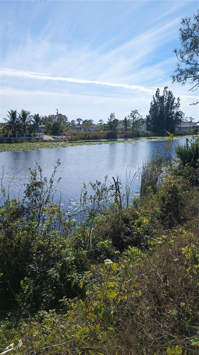 Discover the Perfect opportunity to build your dream home on this stunning .23 acre waterfront lot located on a peaceful freshwater canal in the highly desirable city of Cape Coral, Fl. This property offers direct canal access, ideal for fishing, kayaking, or simply enjoying the serene water views. Nestled in a quiet neighborhood with quick access to schools, parks, shopping, and dining. This lot is ready to become your private oasis. Whether you're looking to create a year-round residence or a vacation retreat, this lot provides endless possibilities in one of Florida's most sought-after areas. Don't miss your chance to own a Perfect Piece of Paradise!