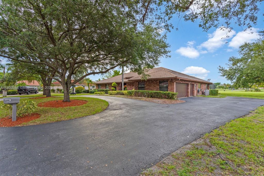 Photo of 10971 NW 24th St, Coral Springs, FL 33065 (MLS # A11830666)