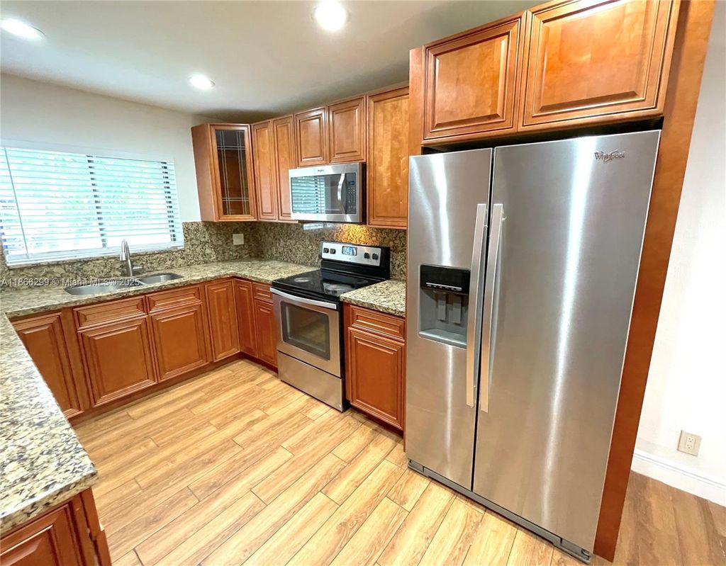 Photo of 7901 NW 33rd St #5, Davie, FL 33024 (MLS # A11866299)