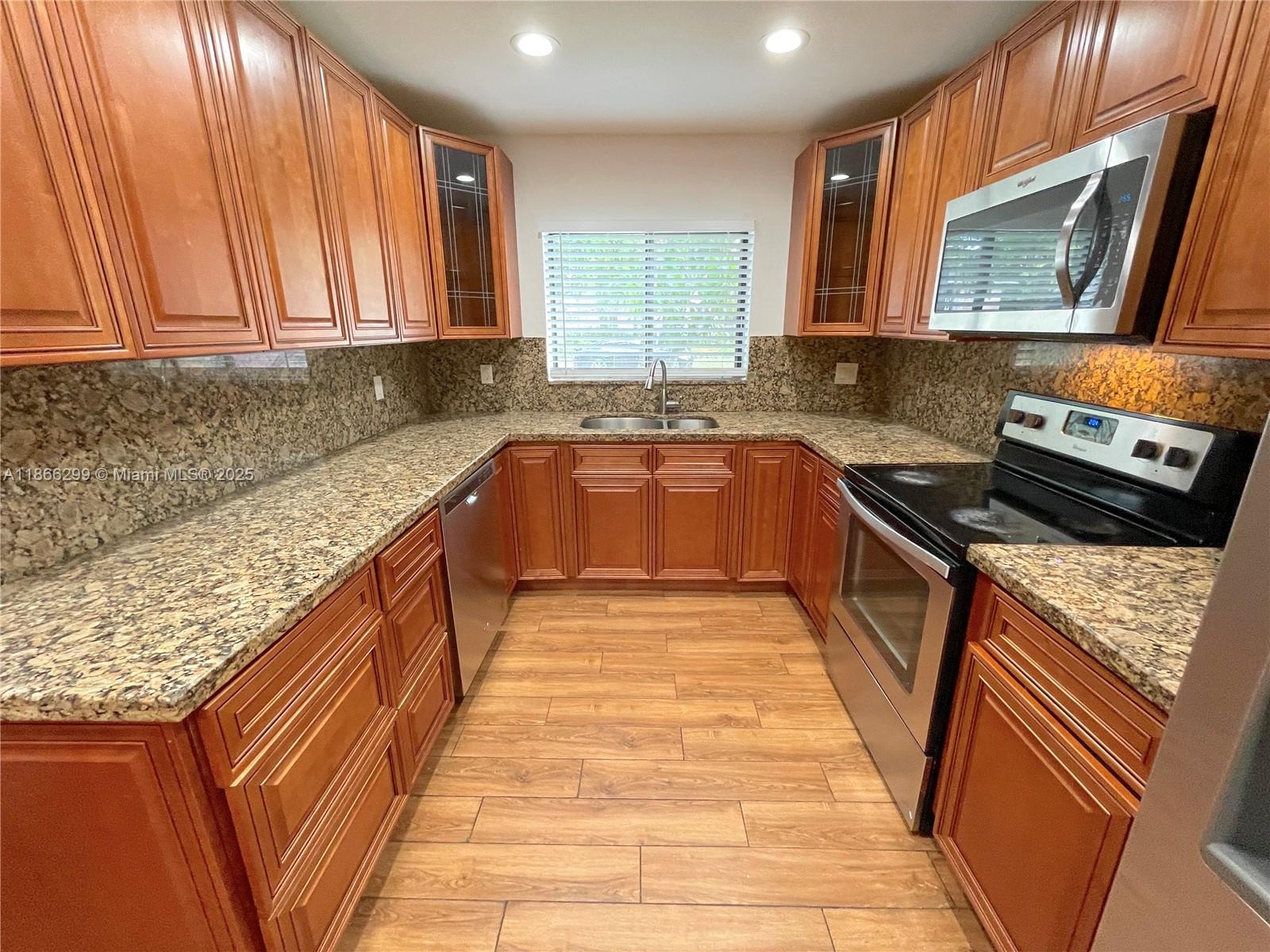 Bright and recently updated 3-bedroom 2.5 bathroom 2 story waterfront town home in a quiet community in Davie. Home features kitchen and living spaces on 1st floor, and bedrooms on 2nd floor; fenced in backyard overlooking canal; screened in front porch; large well appointed eat in kitchen with granite counters and stainless appliances; two parking spots; laminate and tile flooring throughout; and ample storage space, including walk in closets and separate storage room with washer and dryer. Pet okay with additional fee. First months rent, last months rent, and security deposit due upon move in.