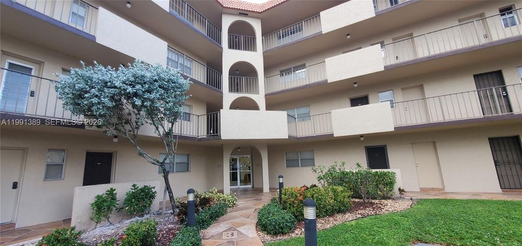 Photo of 6361 N Falls Cir Dr #106, Lauderhill, FL 33319 (MLS # A11991389)