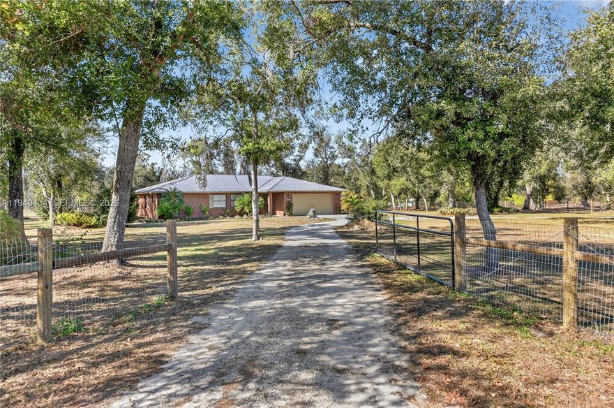 A rare opportunity to own a peaceful country retreat set on approximately 3.86 acres in desirable Arcadia, Florida! This 3-bedroom, 2-bath, office, brick home offers timeless charm and serene rural living with a spacious interior and functional layout. Both bathrooms feature updated shower surrounds, adding a fresh touch while maintaining the home's original character. The primary suite is generously sized, and natural light fills the living spaces throughout. The expansive outdoor space provides endless possibilities - ideal for hobbies, recreational toys, animals, or simply enjoying wide-open land and privacy. Zoned A-5, allowing for a variety of agricultural and residential uses, including horses, livestock, or a hobby farm lifestyle. (buyer to verify permitted uses with the county) Enjoy the freedom and tranquility of country living while still being just minutes from town, schools, and everyday conveniences. Quiet. Space. Freedom. True Florida country living awaits.