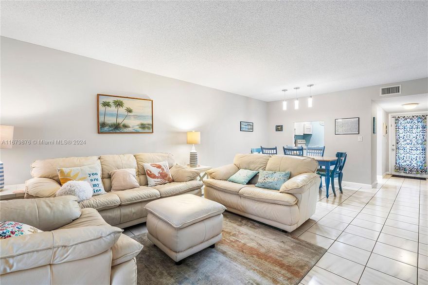 Welcome to your coastal inspired escape! This 2/2 home captures the essence of beach living with its cozy, warm interiors and light-filled spaces. Each corner of this home is designed to make you feel relaxed and at ease. Situated in a highly walkable community, you're just steps away from all you need- Publix, shopping, dining, entertainment, & only 7 miles from the beach. Surrounded by tranquil lakes, the serene environment adds to the charm of this home.

The community is welcoming, vibrant and active! From bingo, karaoke, piano sing-alongs, Super Bowl parties, Christmas parties, pool aerobics, and more, this is more than just a house- it's a place where memories are made, relaxation comes naturally, and there's always something exciting to do.

Property can be sold with furniture.