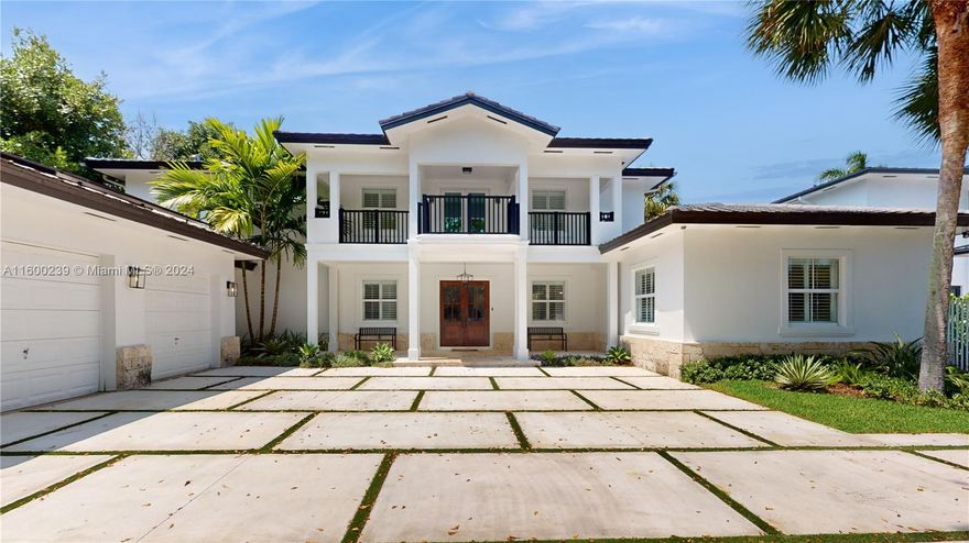 Experience luxury in this exquisite 7-bed, 7-bath home in the heart of South Miami. With over 6,000 sqft on a 14,200+ sqft lot, this residence features a grand living room with double-height ceilings and a designer lamp by Arik Levy. The family room opens to the patio and pool through expansive sliding glass doors. The primary suite includes a large walk-in closet and a spa-like bathroom. Enjoy two terraces with views of the pool and lush garden.The private oasis boasts a patio with a pergola, a summer kitchen, a pool, a jacuzzi, and a basketball court. The modern kitchen is a culinary dream, featuring high-end Miele appliances, quartz countertops, and a spacious, eclectic design. With hurricane-impact windows and doors, wood and marble floors, this home combines luxury and functionality.