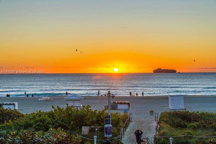 Live in South of Fifth and enjoy a Beautiful Direct oceanfront SE corner w/2nd floor parking covered. Newly remodeled w/large format porcelain floors, spectacular fully equipped open kitchen w/quartz countertops w/waterfall edge, impact windows & doors, venetian plaster finishing, custom lighting & electric blinds-no expense spared & furniture can be included! Largest unit in building w/generous foyer, adorable bar area w/wine cooler, spacious bath w/room for washer dryer (which is allowed), natural light in every room, & more. South of 5th w/oceanfront heated pool, gym, complimentary beach service w/chairs & umbrellas, & low fees that include reserves.