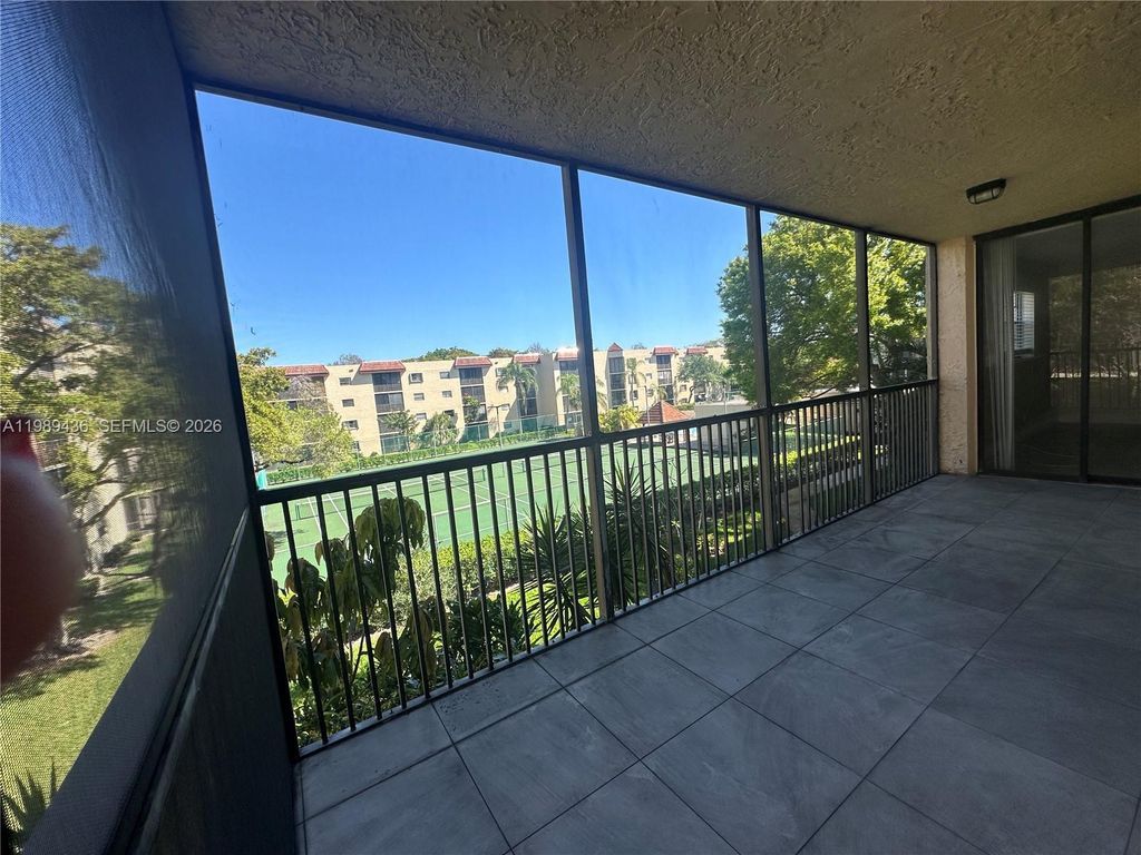 Photo of 10401 W Broward Blvd #301, Plantation, FL 33324 (MLS # A11989436)