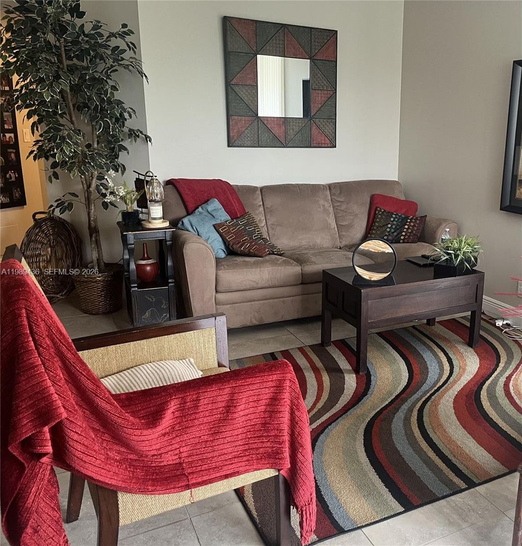 Photo of 10401 W Broward Blvd #301, Plantation, FL 33324 (MLS # A11989436)