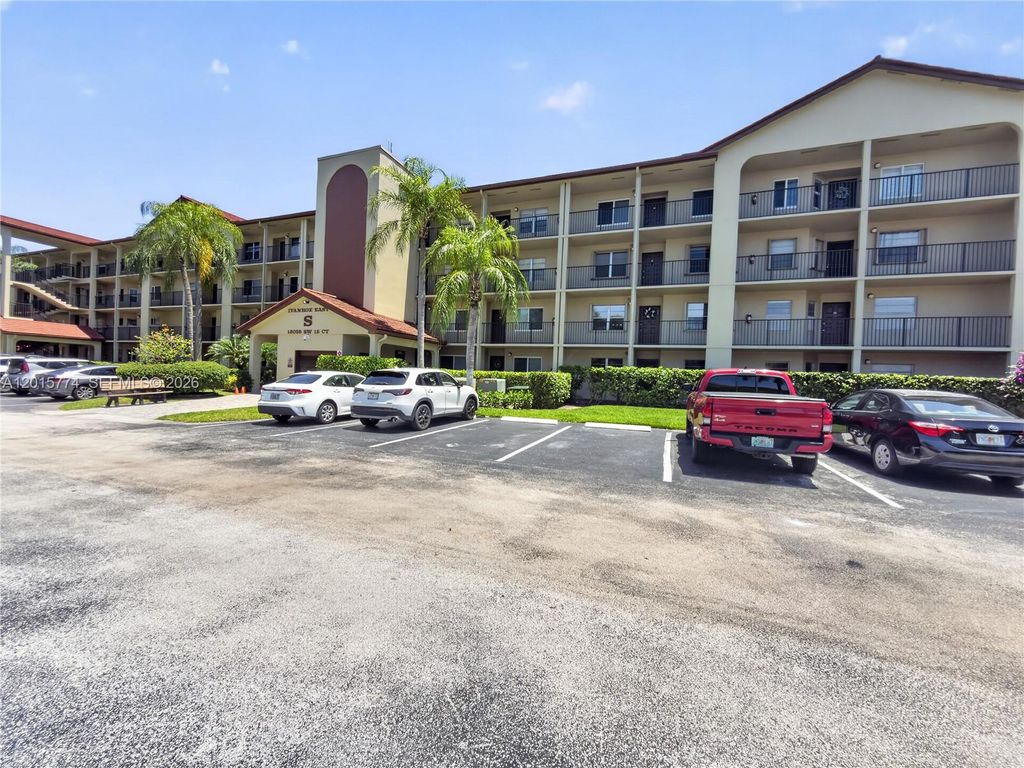 Photo of 13055 SW 15th Ct #307S, Pembroke Pines, FL 33027 (MLS # A12015774)