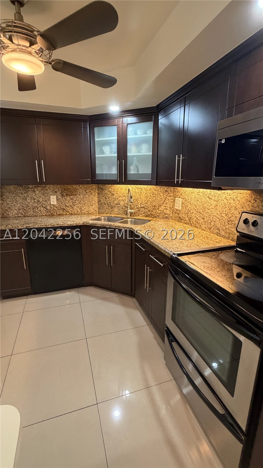 Photo of 3280 Spanish Moss Ter #214, Lauderhill, FL 33319 (MLS # A12042256)