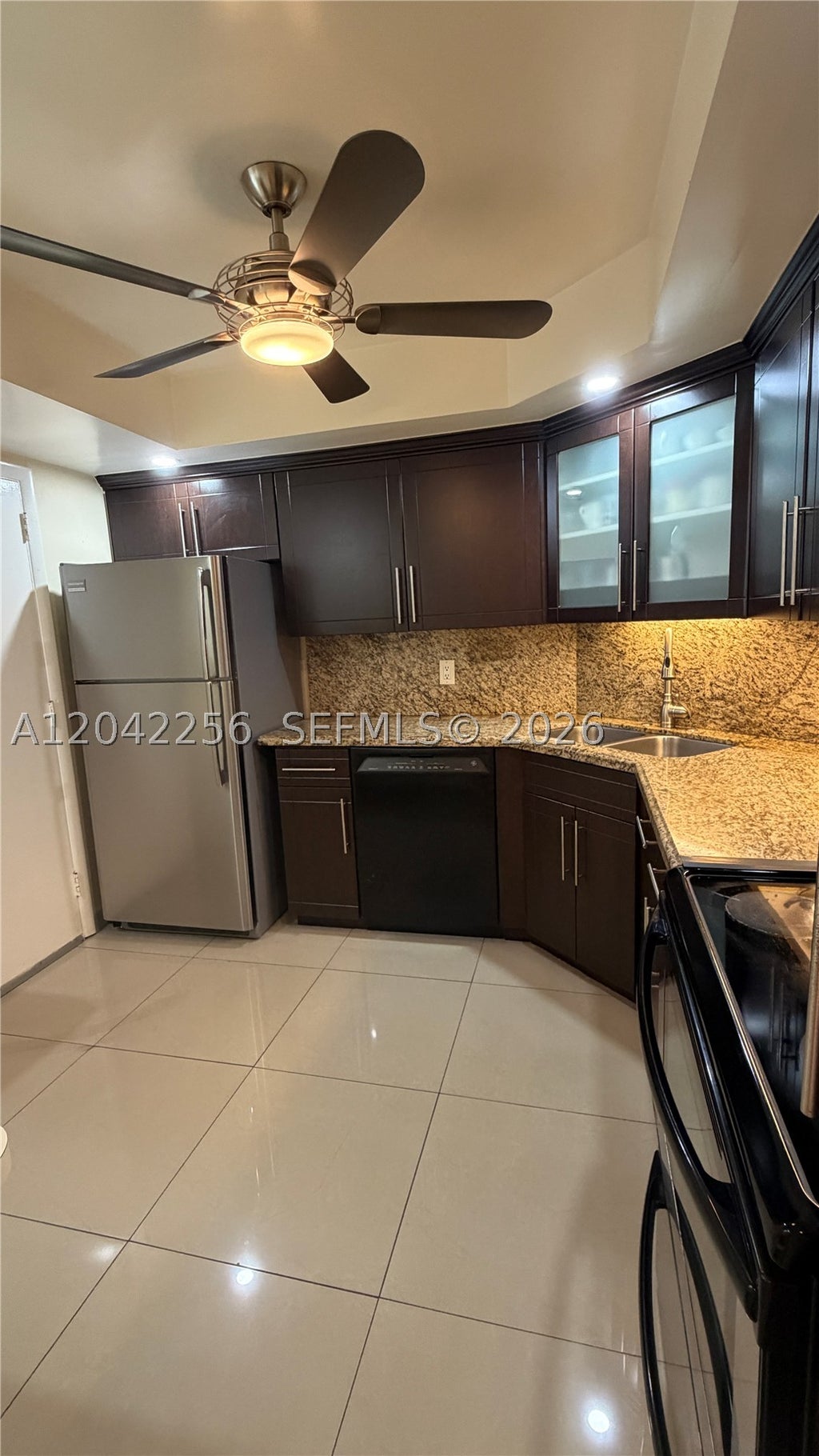 Photo of 3280 Spanish Moss Ter #214, Lauderhill, FL 33319 (MLS # A12042256)