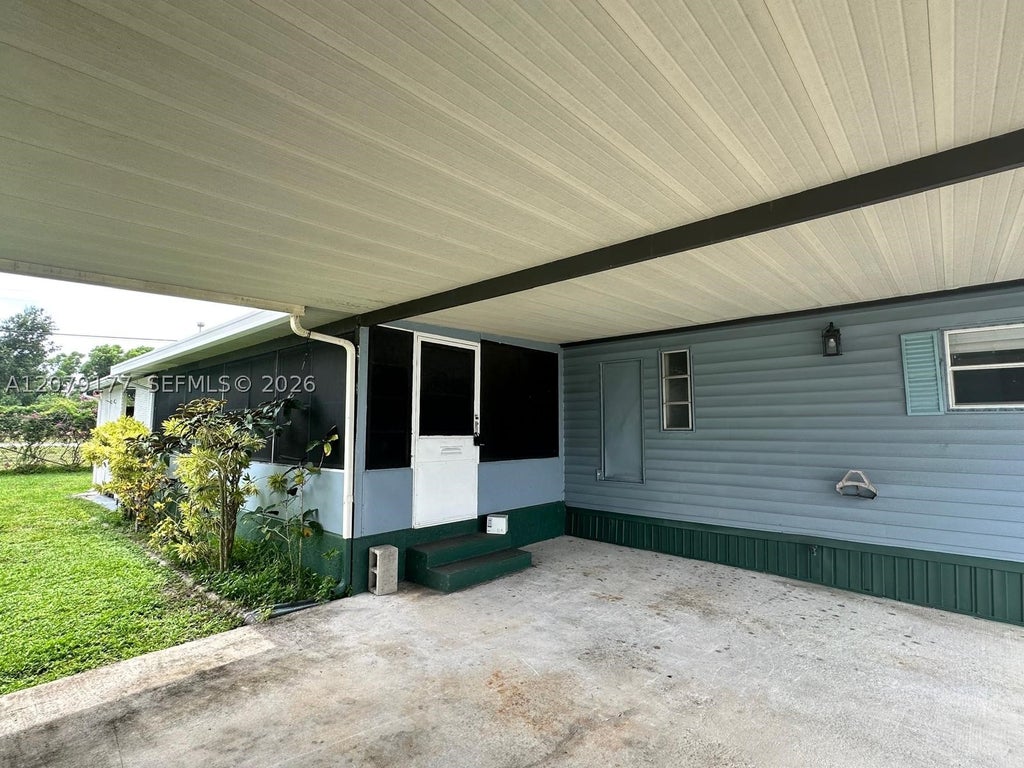 Photo of 4046 67th Ln, Riviera Beach, FL 33404 (MLS # A12079177)