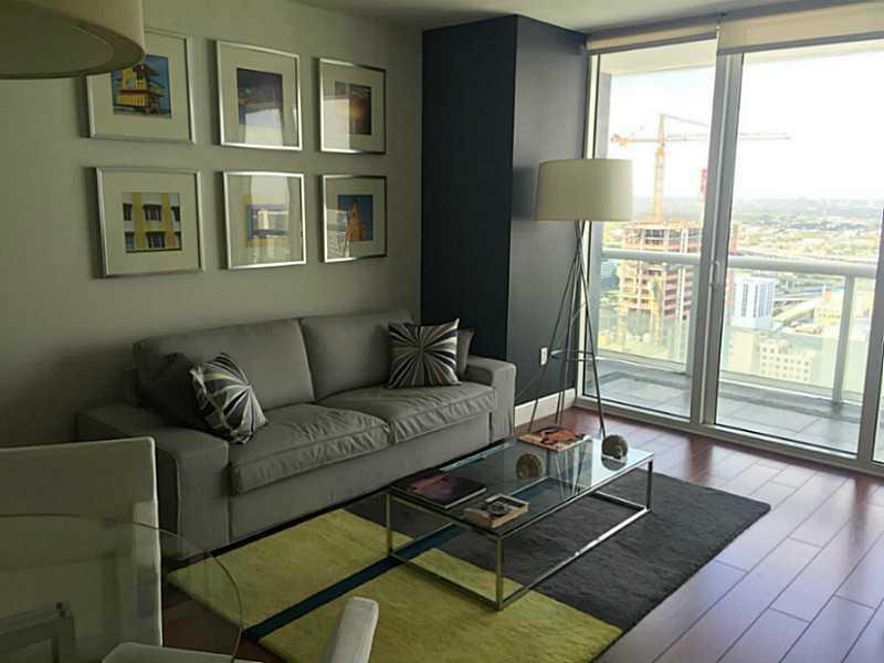 PRICE IS NEGOTIABLE! Enjoy spectacular city views of Downtown Miami from this 1/1 fully upgrade unit with wood floors, California-style closet, and tiled balcony. Unit is in mint condition, and will be sold with furniture, as shown in pictures and brand new appliances. Centrally located next to AAA Arena, Bayfront Park, Metro-Rail Metro-mover stations, trolley, and all major points of interest. Unit is currently rented @ $2,200.00, until Dec 2016.